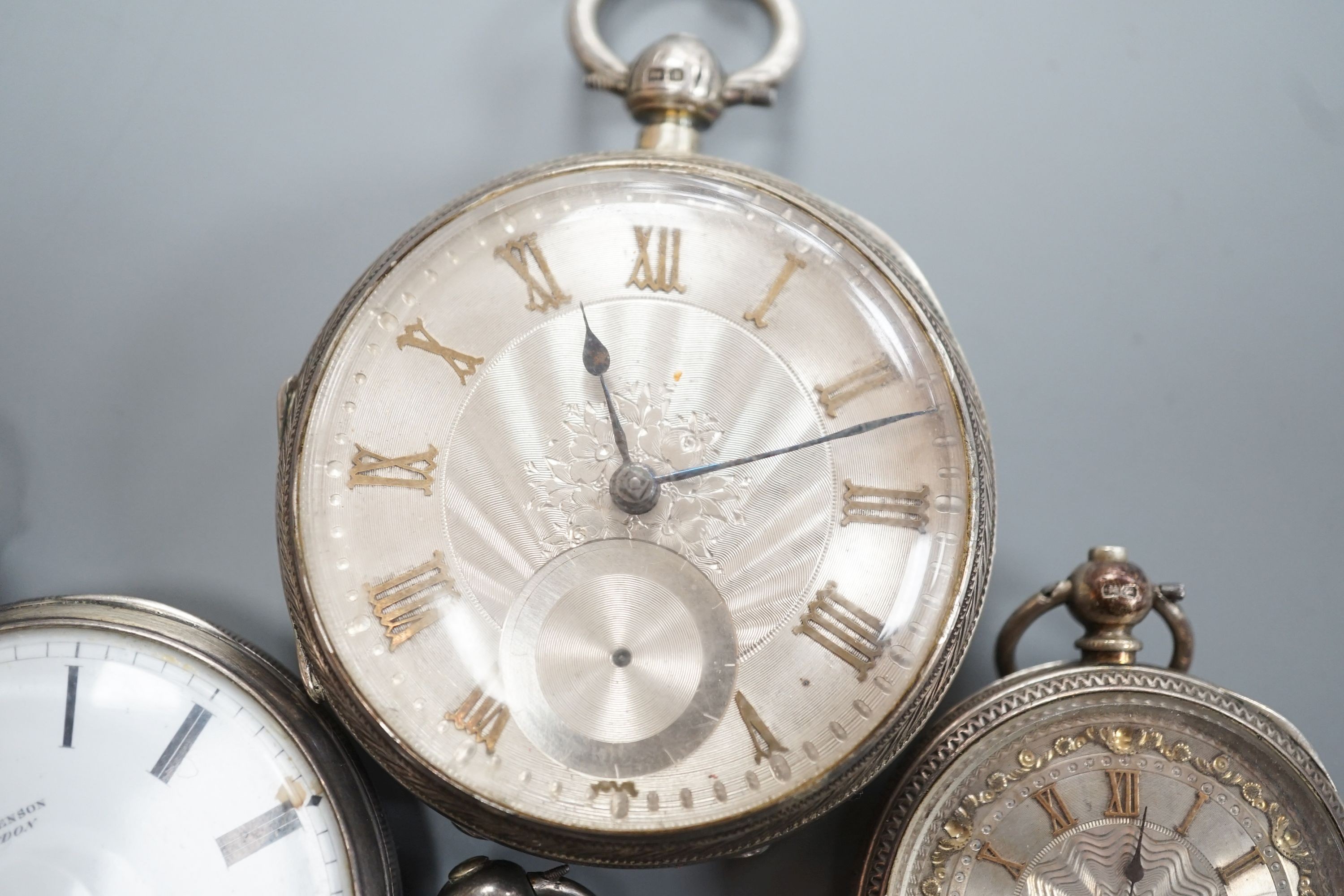 Six assorted late Victorian and later silver or white metal pocket watches, including J.W. Benson.